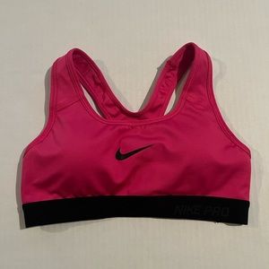Nike hot pink sports bra XS, includes removable pads in the cups